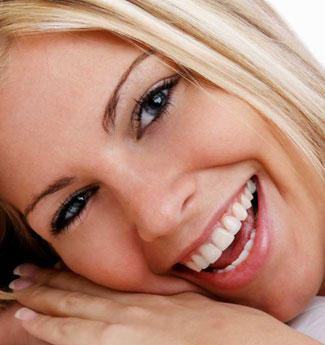 smiling person with veneers