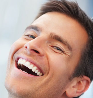 Laughing man with white teeth